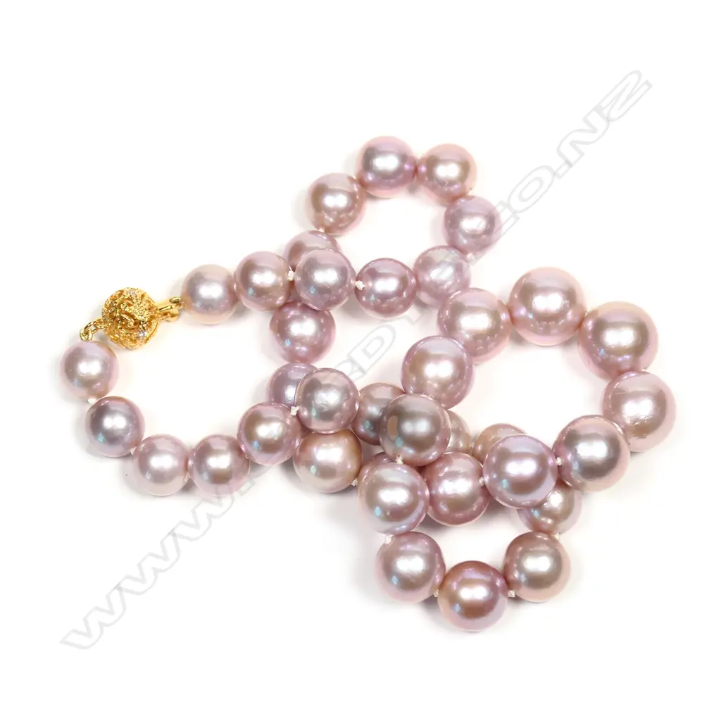 A cultured pearl necklace Image 1++