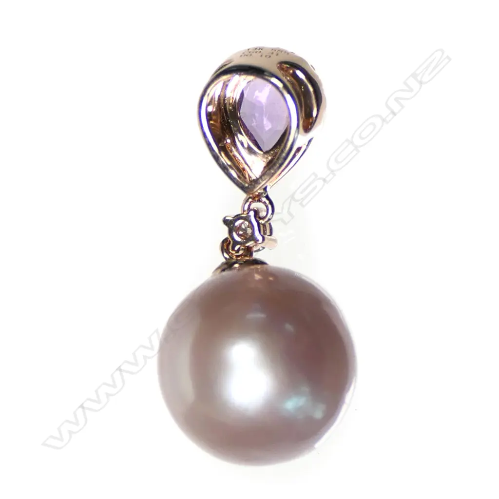 A 14ct rose gold pink pearl sapphire and diamond pendant Image 1++