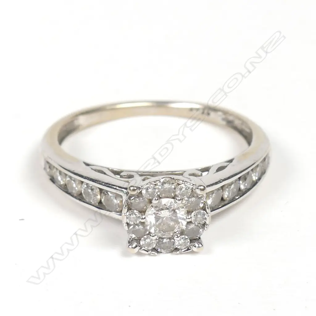 A vintage 14ct white gold and diamond cluster ring Image 1++