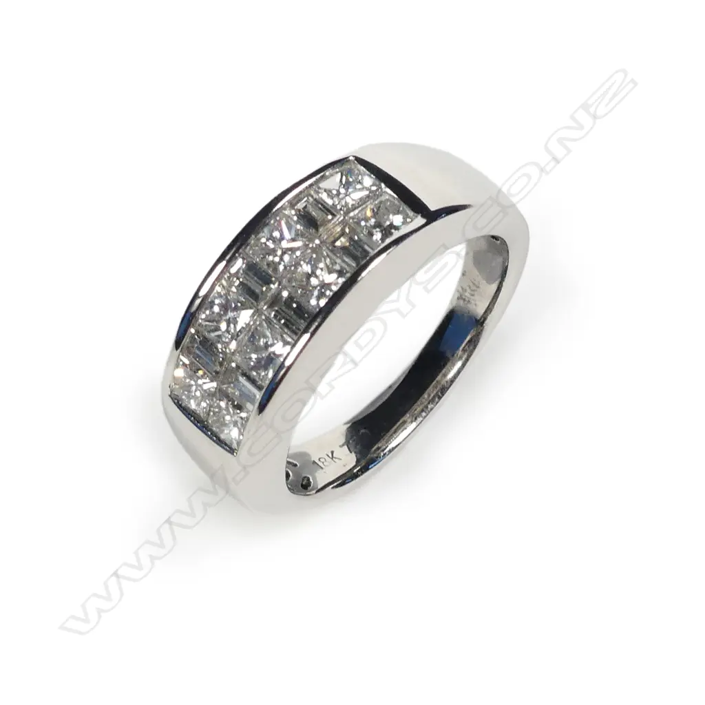 An 18ct white gold and diamond dress ring Image 1++