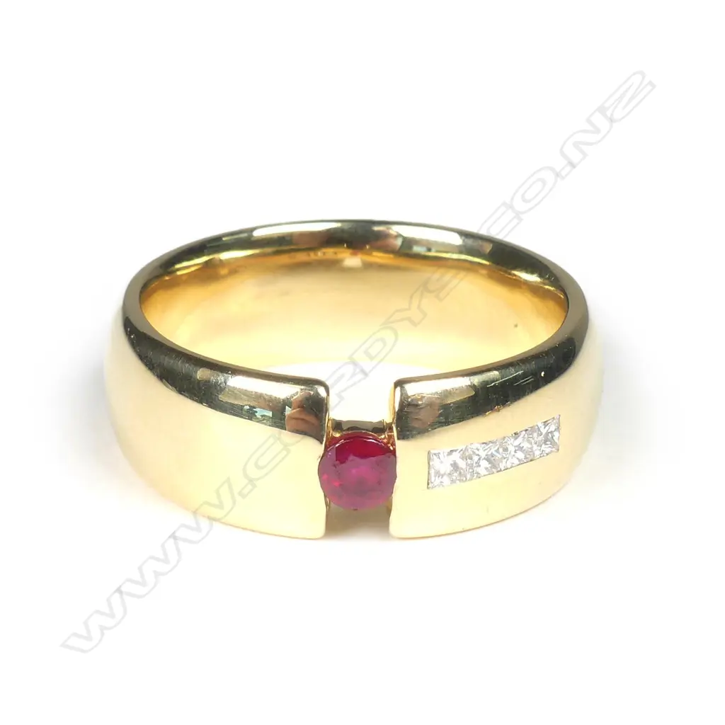 A 18ct gold ruby and diamond ring Image 1++