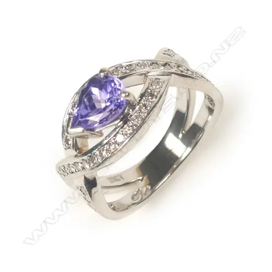 An 18ct white gold tanzanite and diamond ring