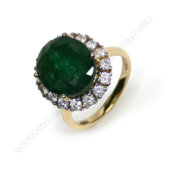 A 14ct gold emerald and diamond ring