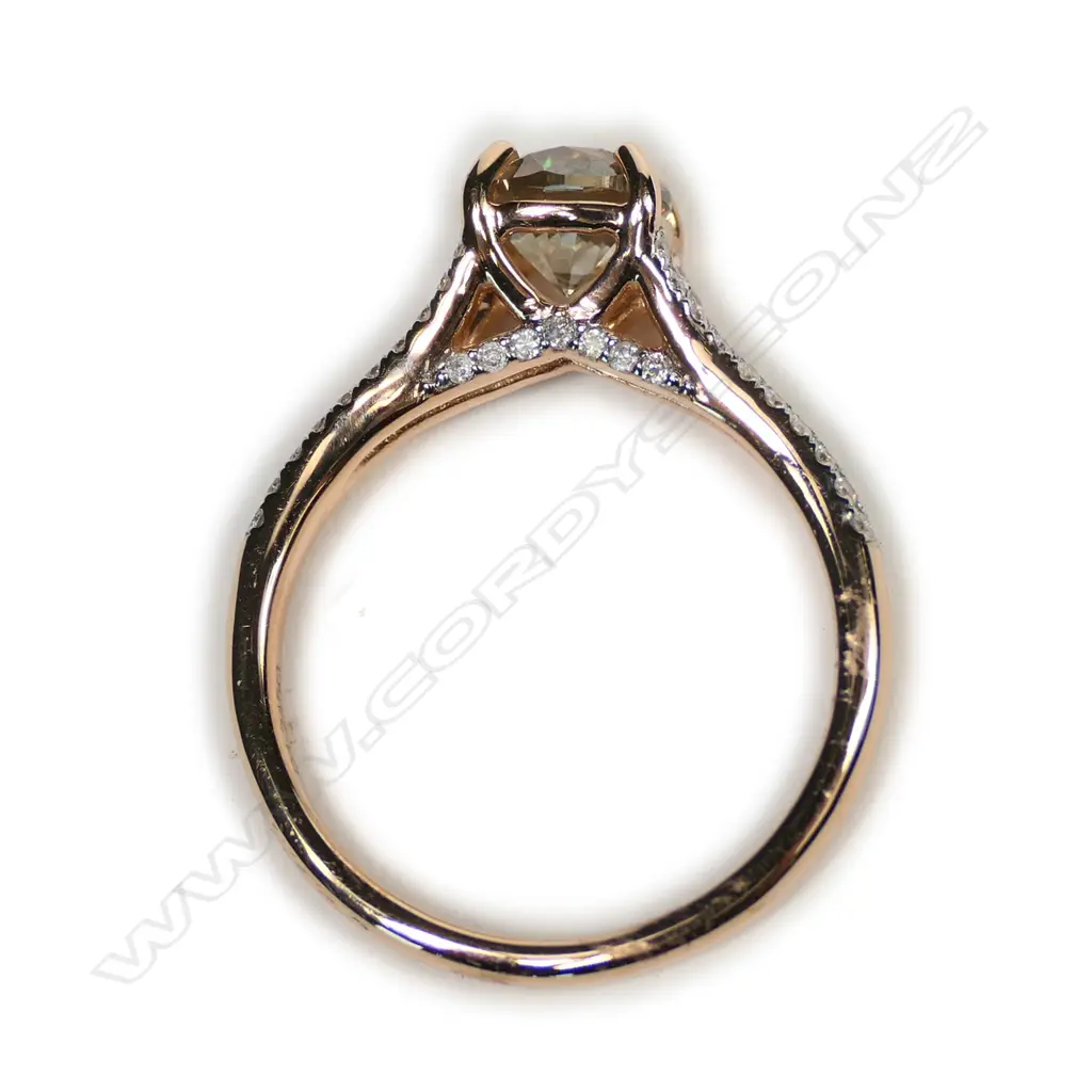 A 14ct rose gold diamond ring Image 1++