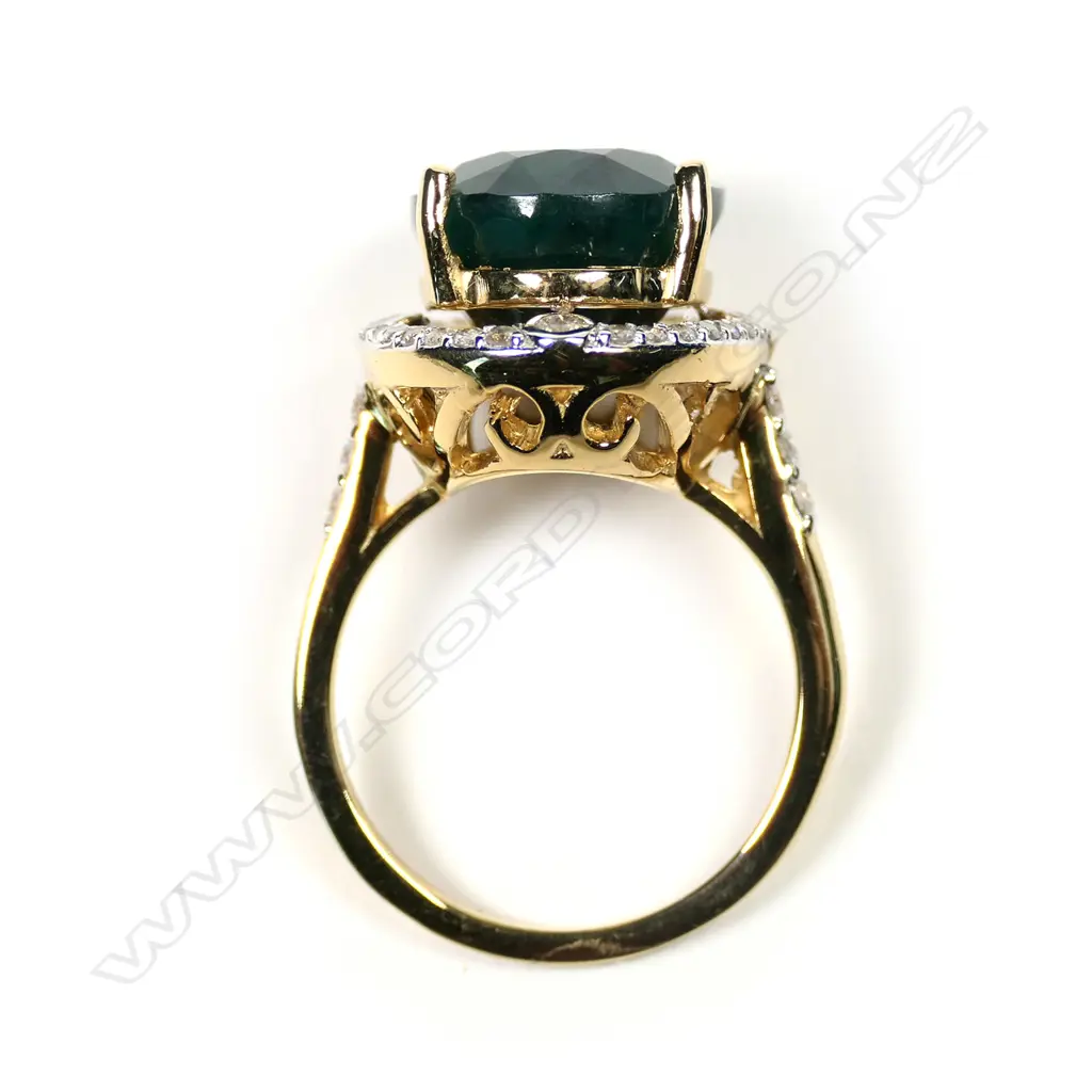 A 14ct gold emerald and diamond ring Image 1++
