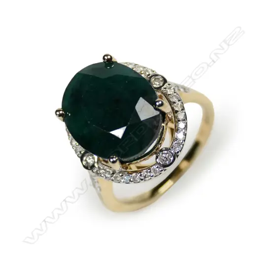 A 14ct gold emerald and diamond ring