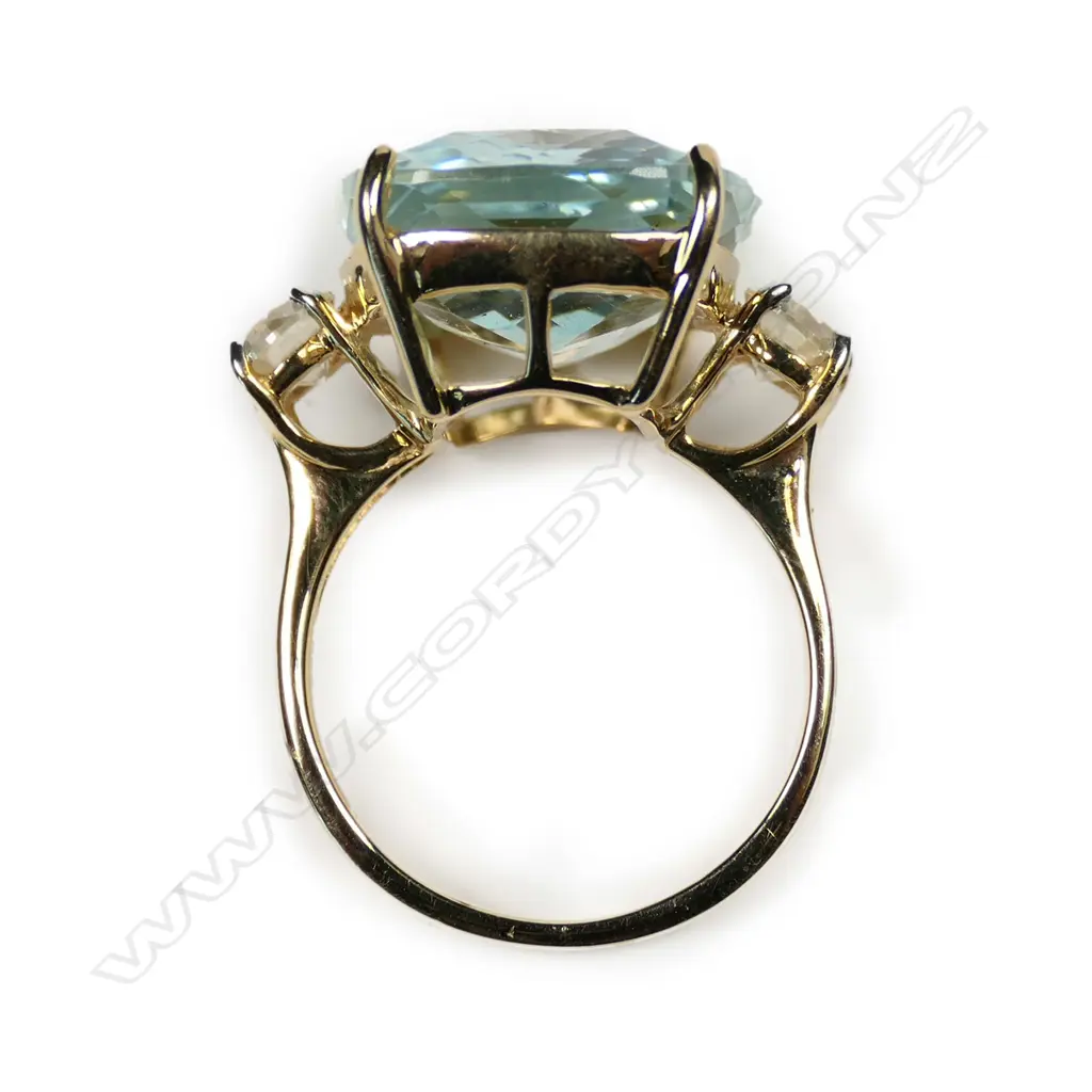 A 14ct gold aquamarine and diamond ring Image 1++