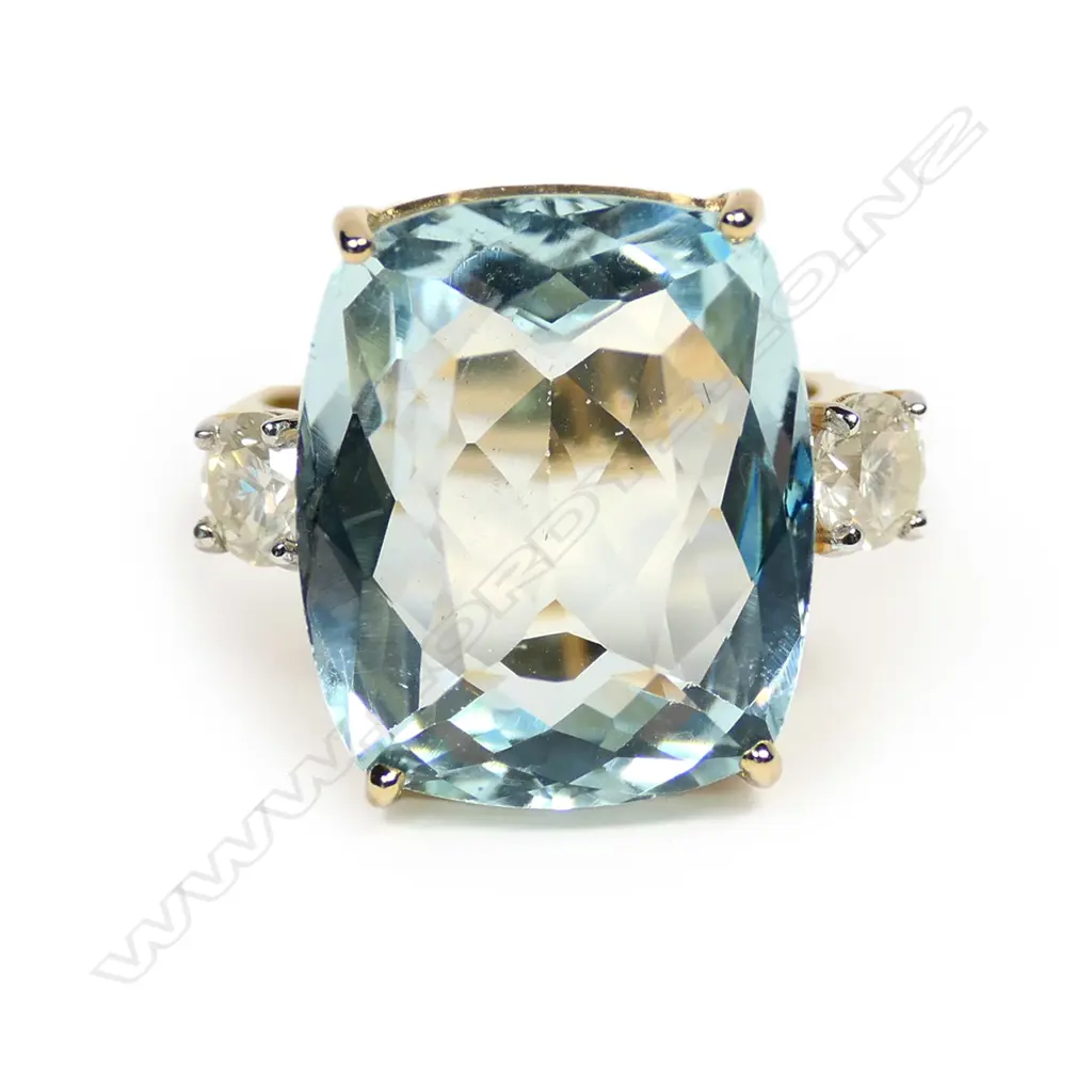 A 14ct gold aquamarine and diamond ring Image 1++