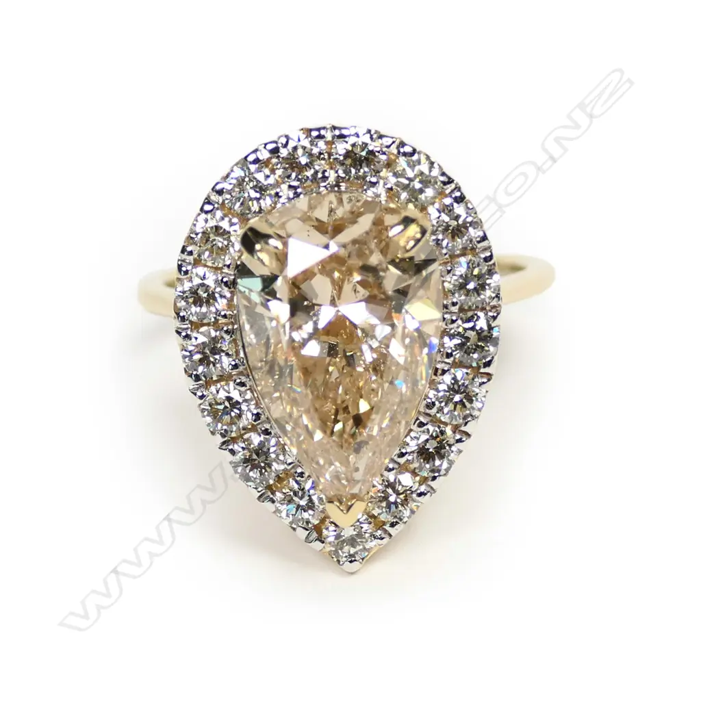 A 14ct gold and diamond ring Image 1++