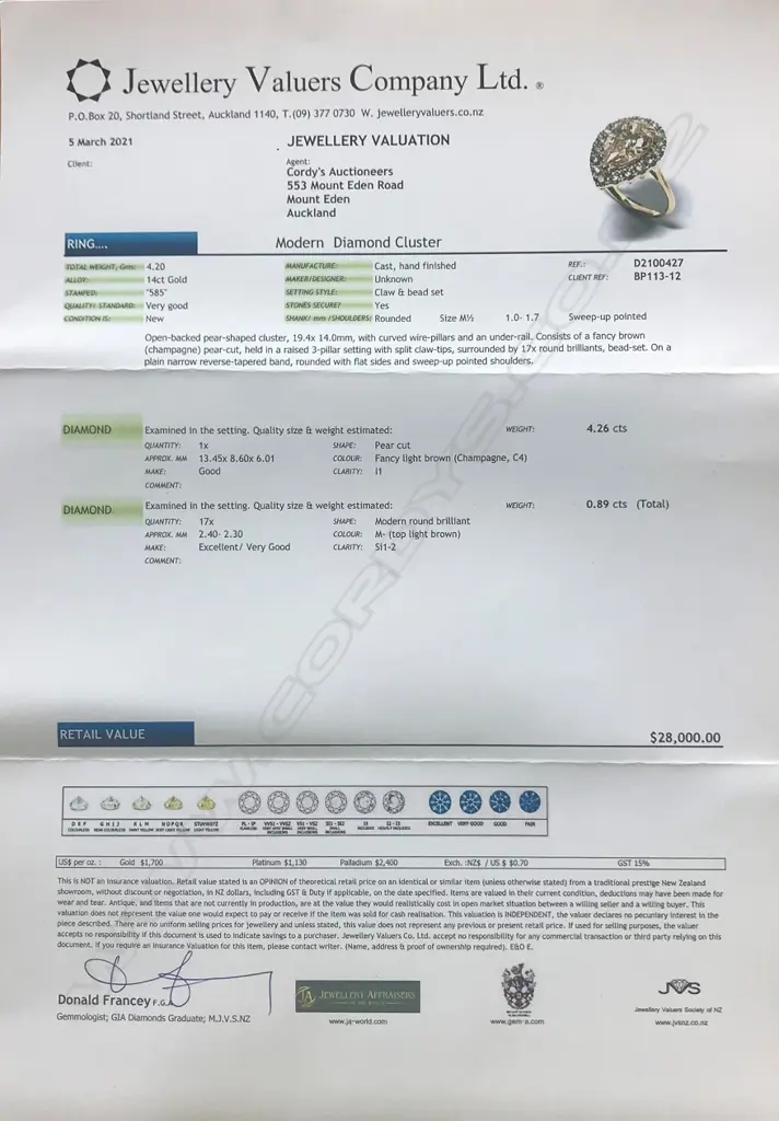 A 14ct gold and diamond ring Image 1++