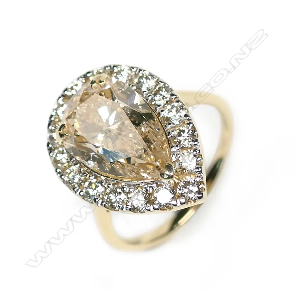 A 14ct gold and diamond ring Image 1++