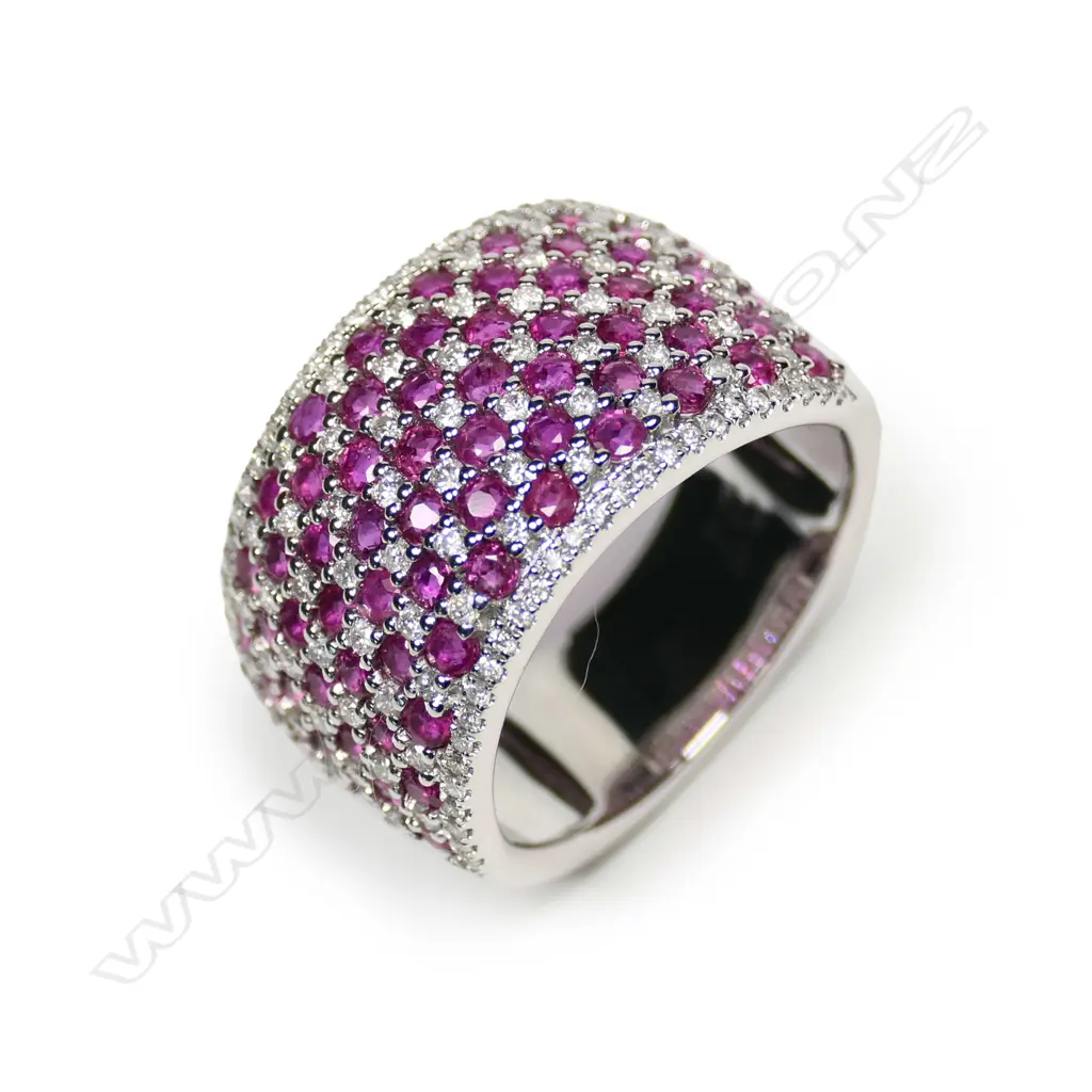 A 14ct white gold ruby and diamond cluster ring Image 1++