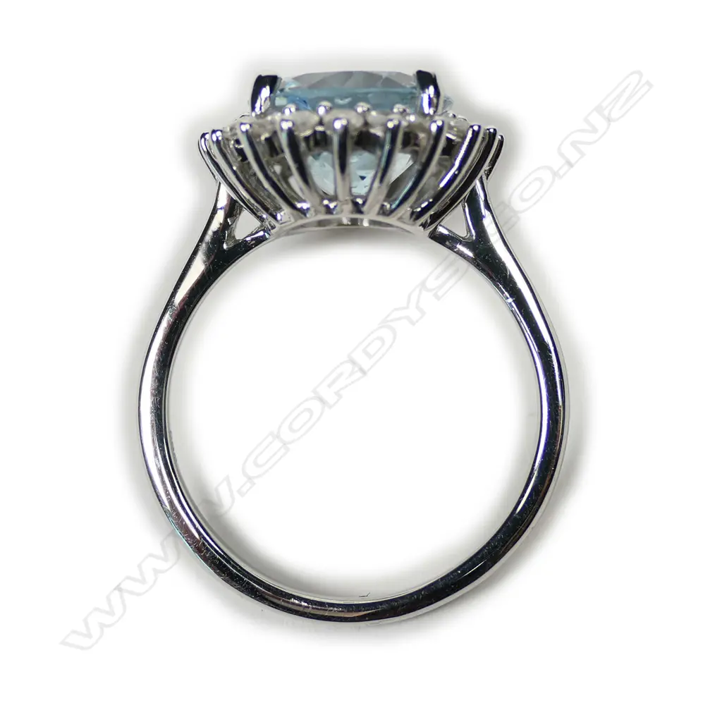 A 14ct white gold aquamarine and diamond ring Image 1++