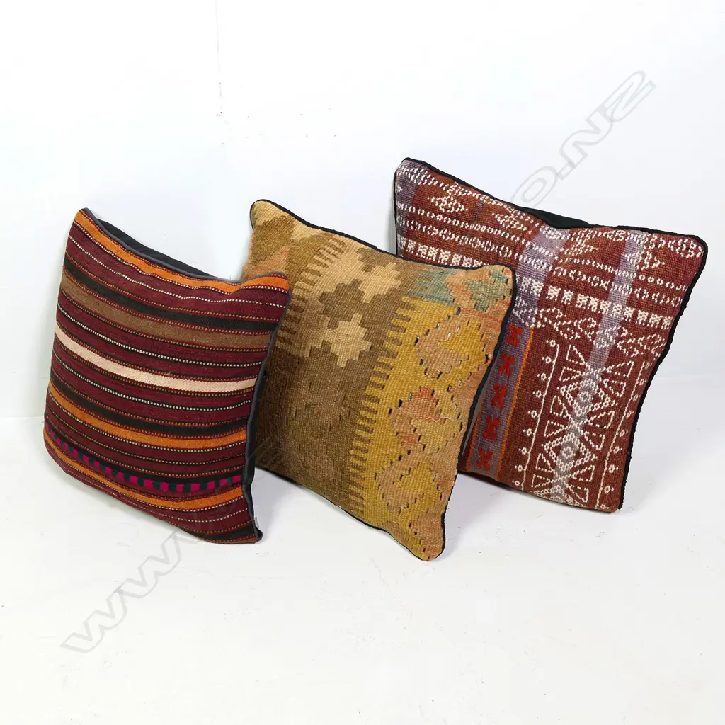 Three Persian rug covered cushions Image 1++