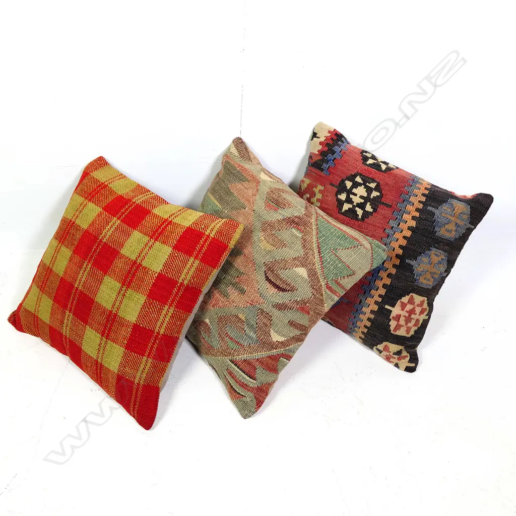 Three Persian covered cushions Image 1++