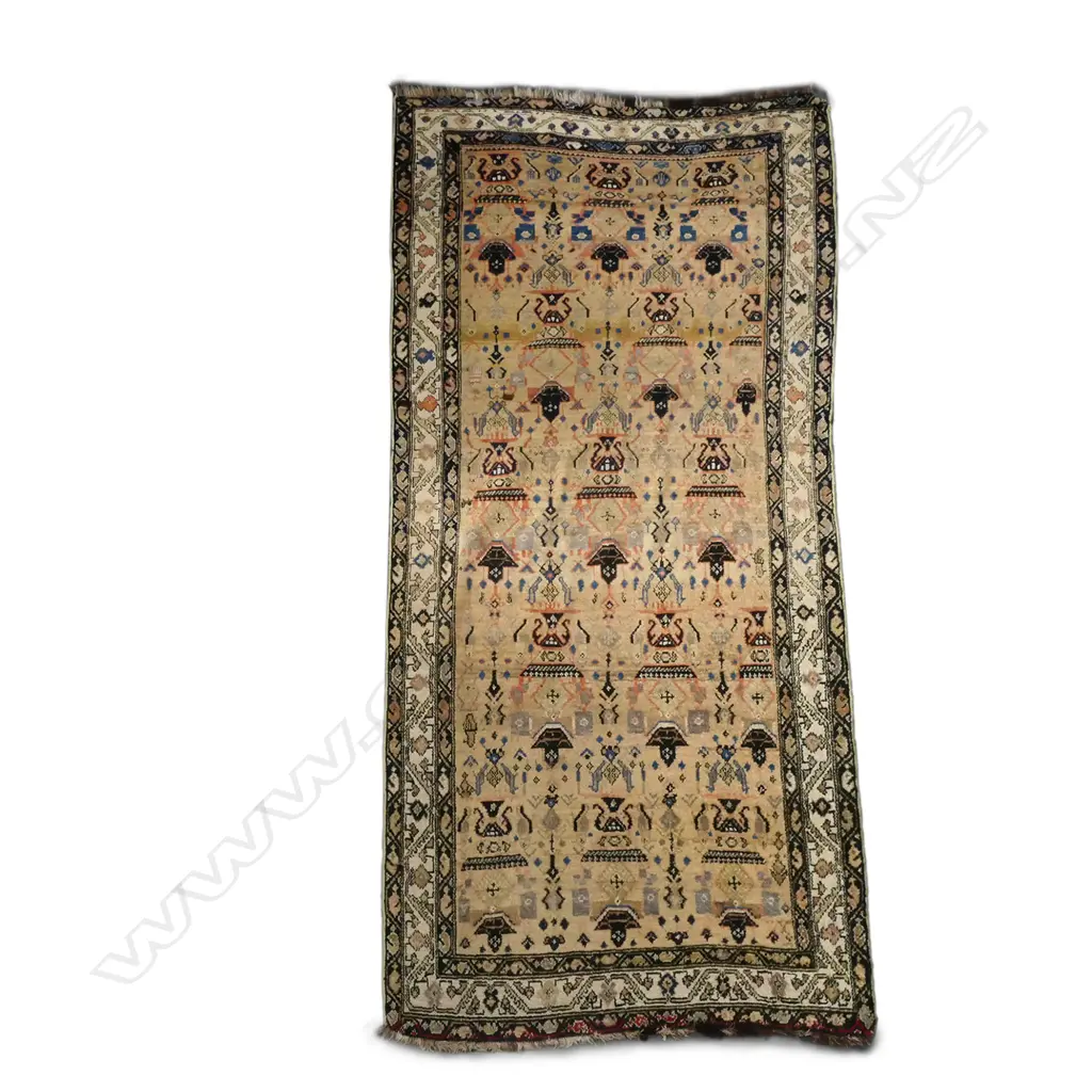 An antique Persian rug Image 1++