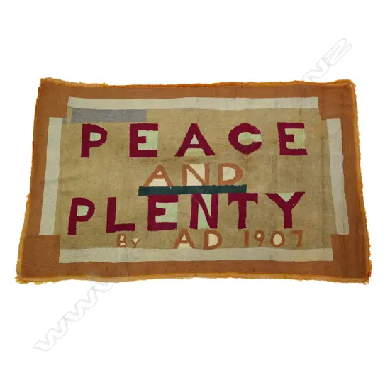 An uncommon Arts and Crafts hand stitched loop pile "PEACE AND PLENTY BY A.D.1907" rug