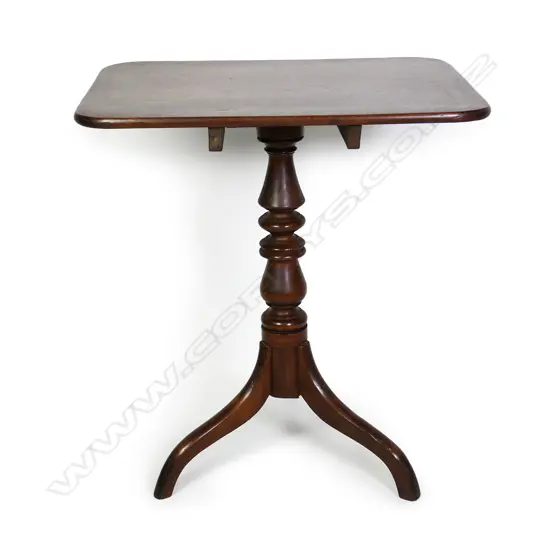 A Regency mahogany tilt-top wine table