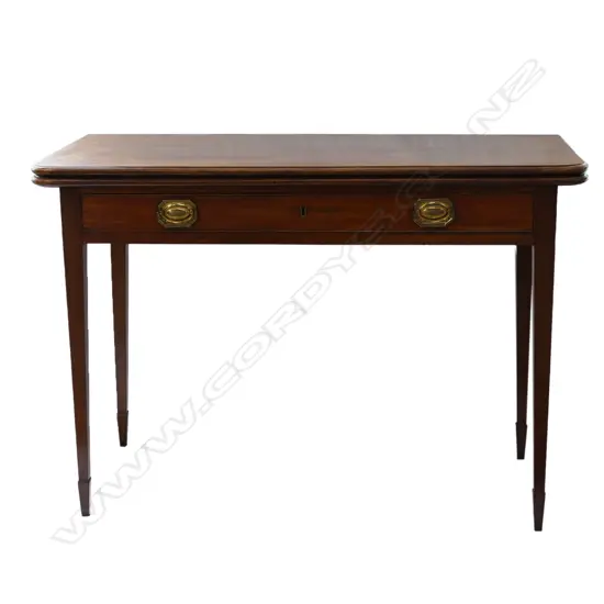 A Regency mahogany flap top supper table