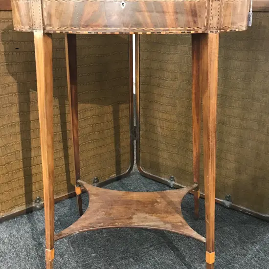 An Edwardian Sheraton Revival side table