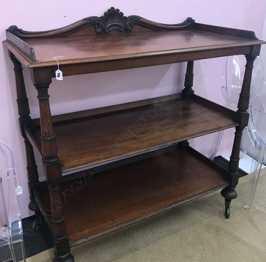 A Victorian mahogany dumb waiter Image 1++