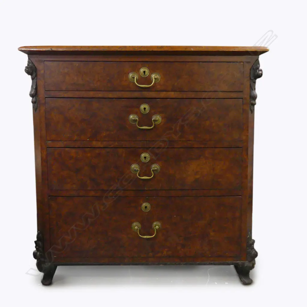 An unusually small-proportioned chest of four drawers Image 1++