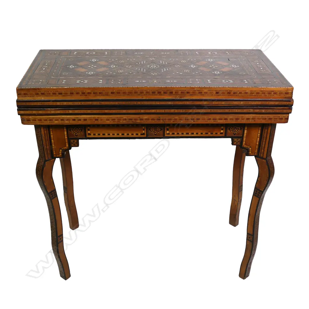 An early 20thC Syrian inlaid games table Image 1++