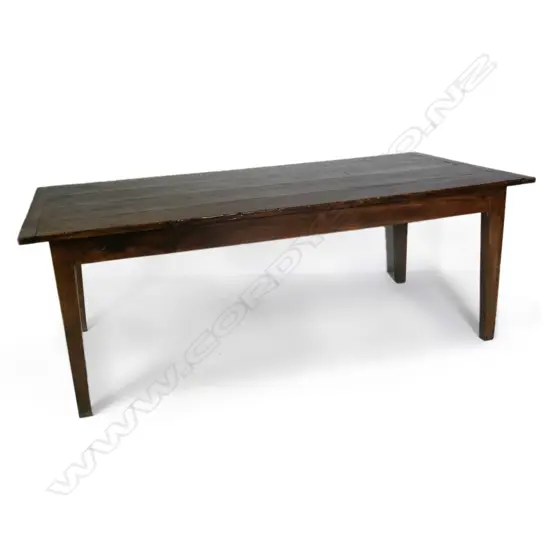 A plank top fruitwood and pine farmhouse dining table