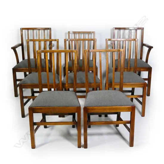 A set of eight Sefton Powrie walnut and oak Georgian style stick back dining chairs