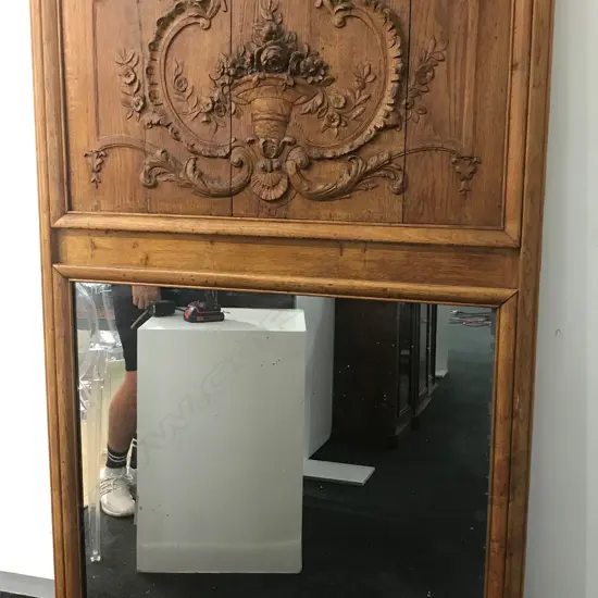 A large oak framed trumeau mirror