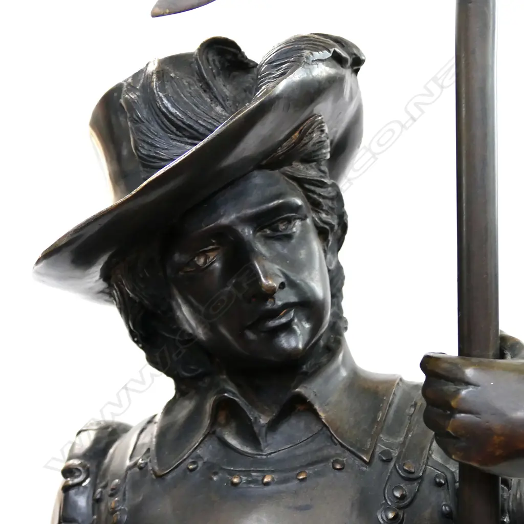 A pair of early 20thC bronze figures of cavaliers Image 1++