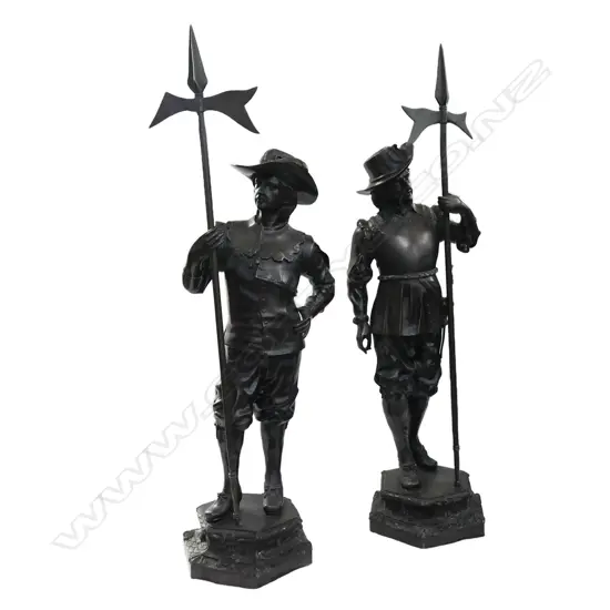 A pair of early 20thC bronze figures of cavaliers
