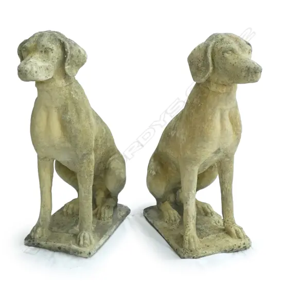 A pair of church stone hunting hounds