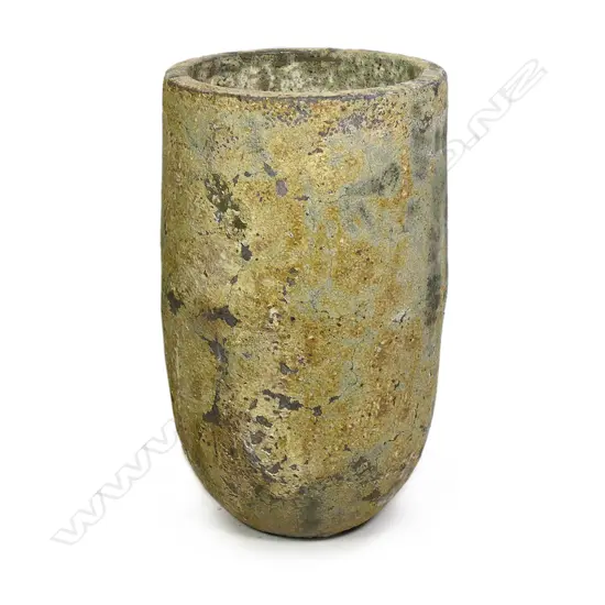 A tall crucible type garden pot