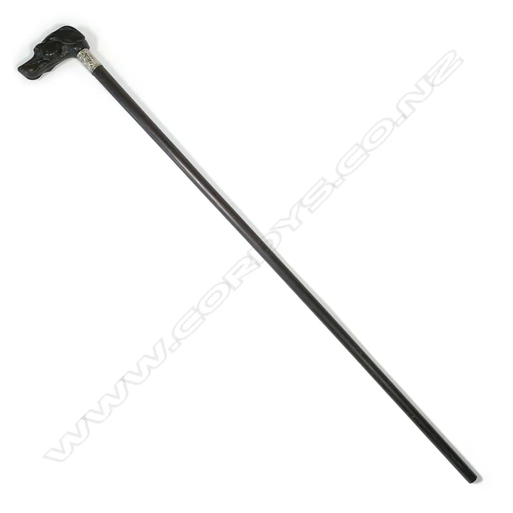 A vintage carved dog head handled walking cane Image 1++