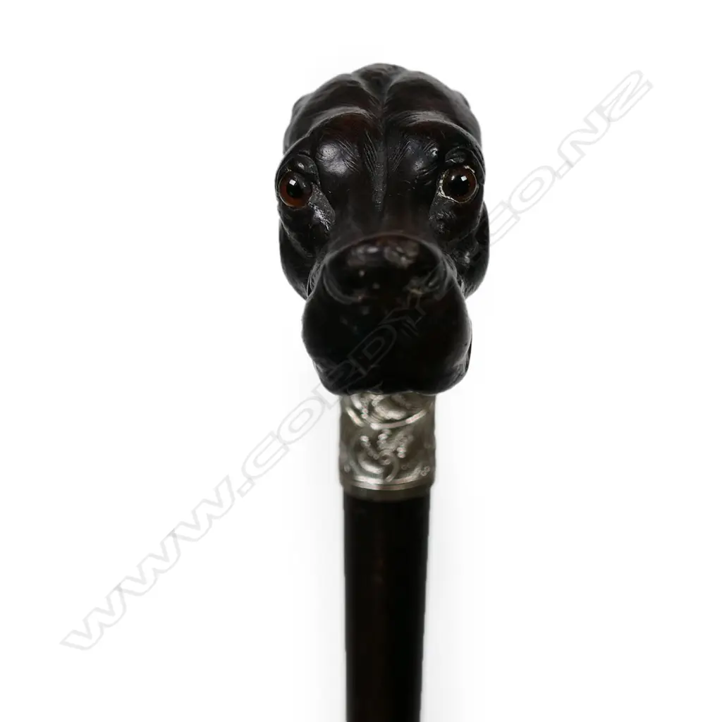 A vintage carved dog head handled walking cane Image 1++