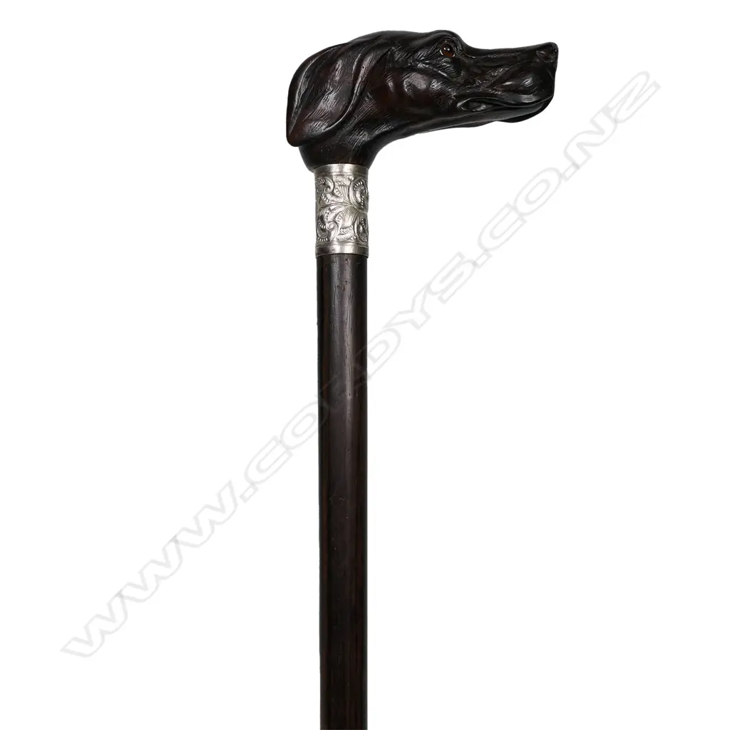 A vintage carved dog head handled walking cane Image 1++