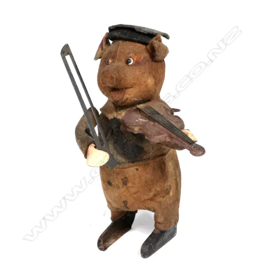 A vintage Schuco clockwork toy pig