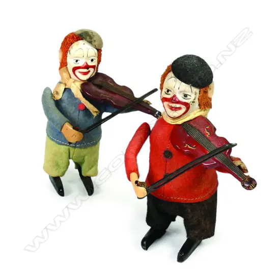 A pair of vintage Schuco clockwork toys