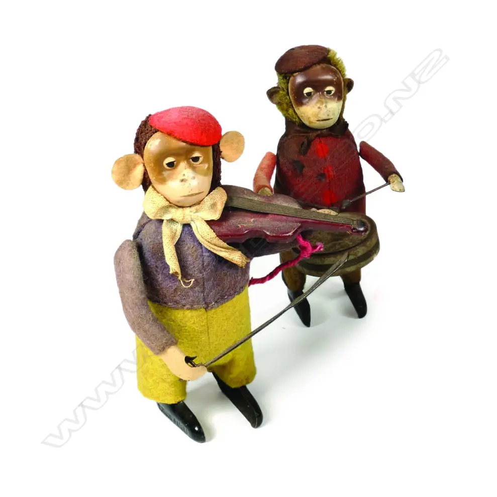 A pair of vintage Schuco clockwork toys Image 1++