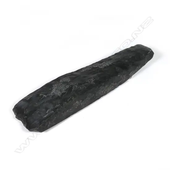 A large Maori pre-European black basalt toki (adze)