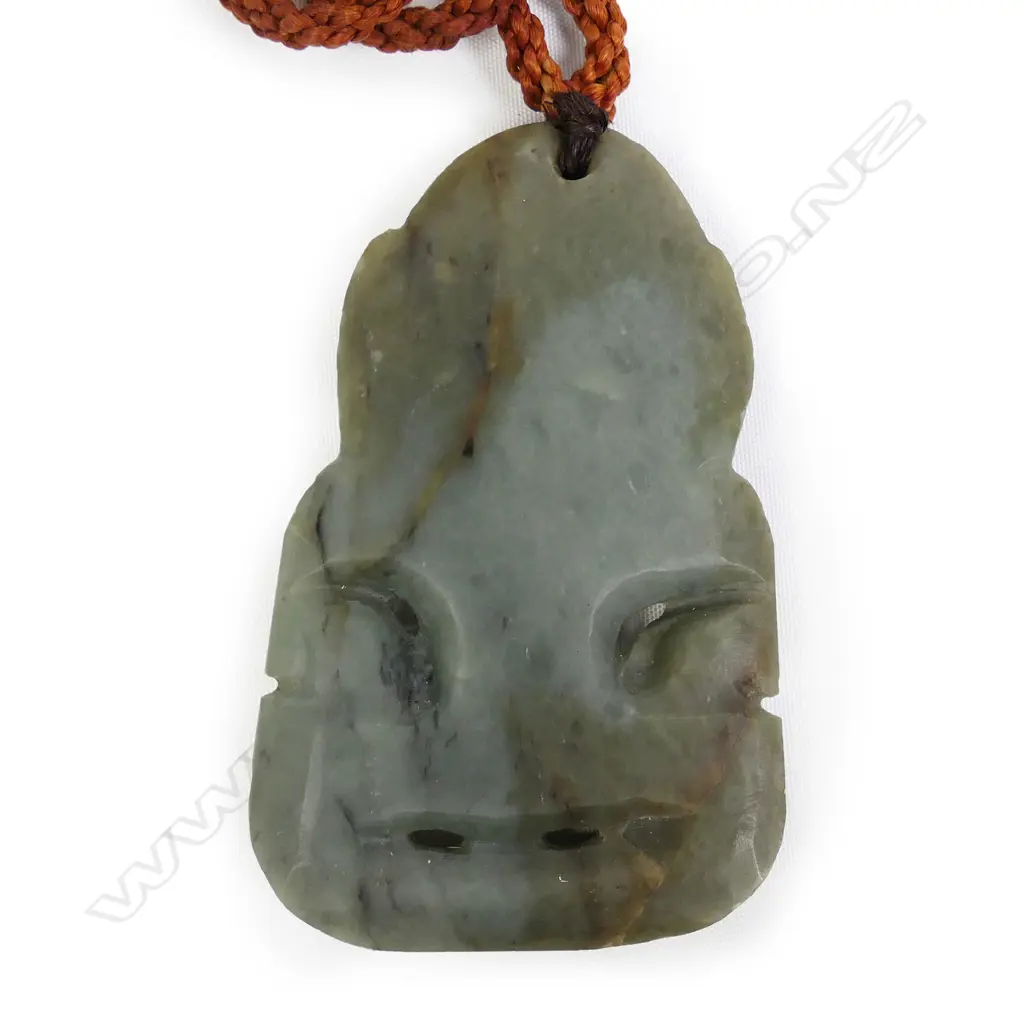 A contemporary stone tooled pounamu hei tiki by Matiu Bartlett Image 1++
