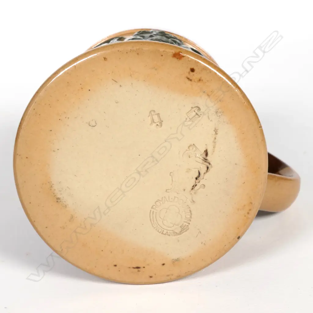 A Royal Doulton salt glaze buff coloured mug Image 1++