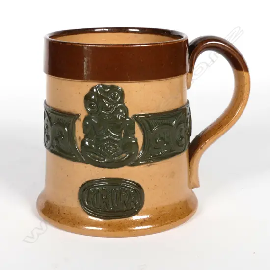 A Royal Doulton salt glaze buff coloured mug