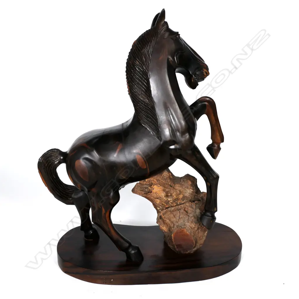 A large carved ebony rearing horse Image 1++