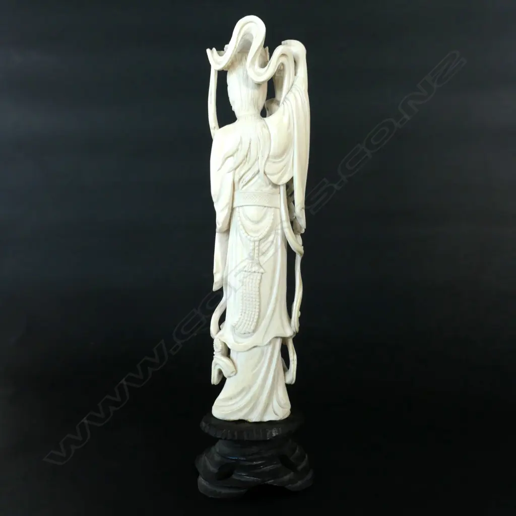 A Chinese carved ivory elegant woman on stand Image 1++