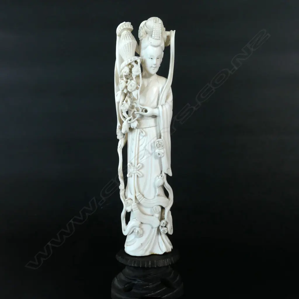 A Chinese carved ivory elegant woman on stand Image 1++