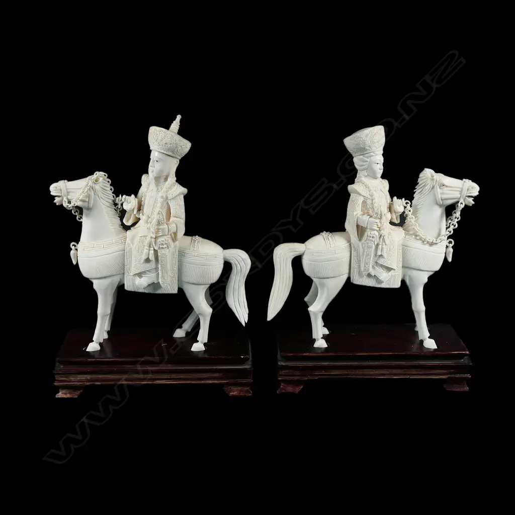 A pair of Chinese carved ivory Emperor and Empress figures on horseback Image 1++