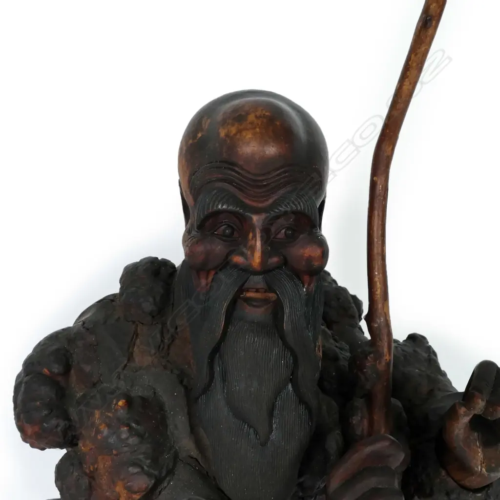 An old Chinese rootstock assemblage and carving of a sage Image 1++