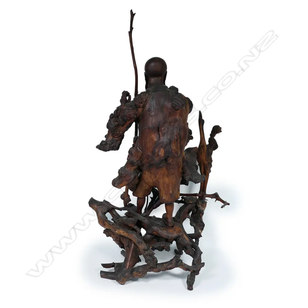 An old Chinese rootstock assemblage and carving of a sage Image 1++